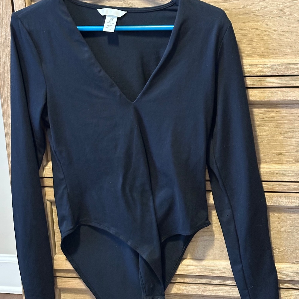 H&M black bodysuit.  Stretchy.  Knit.  Size M